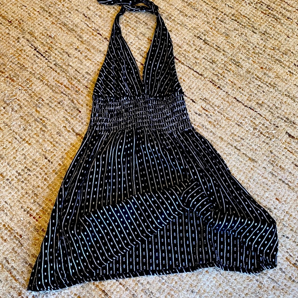 Short, backless, halter top short dress.